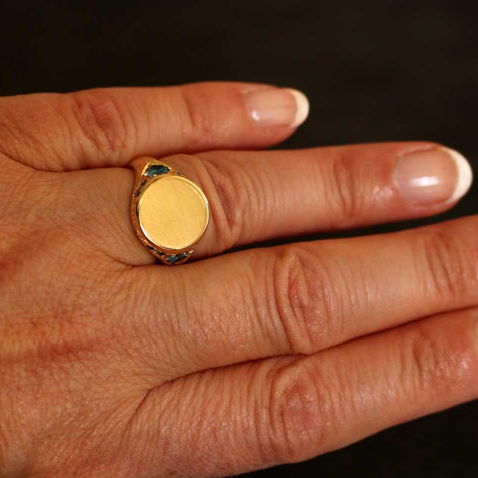 gold ring with blue diamonds (signet ring)