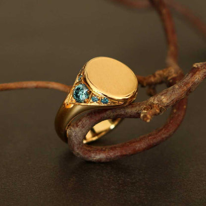 gold ring with blue diamonds (signet ring)