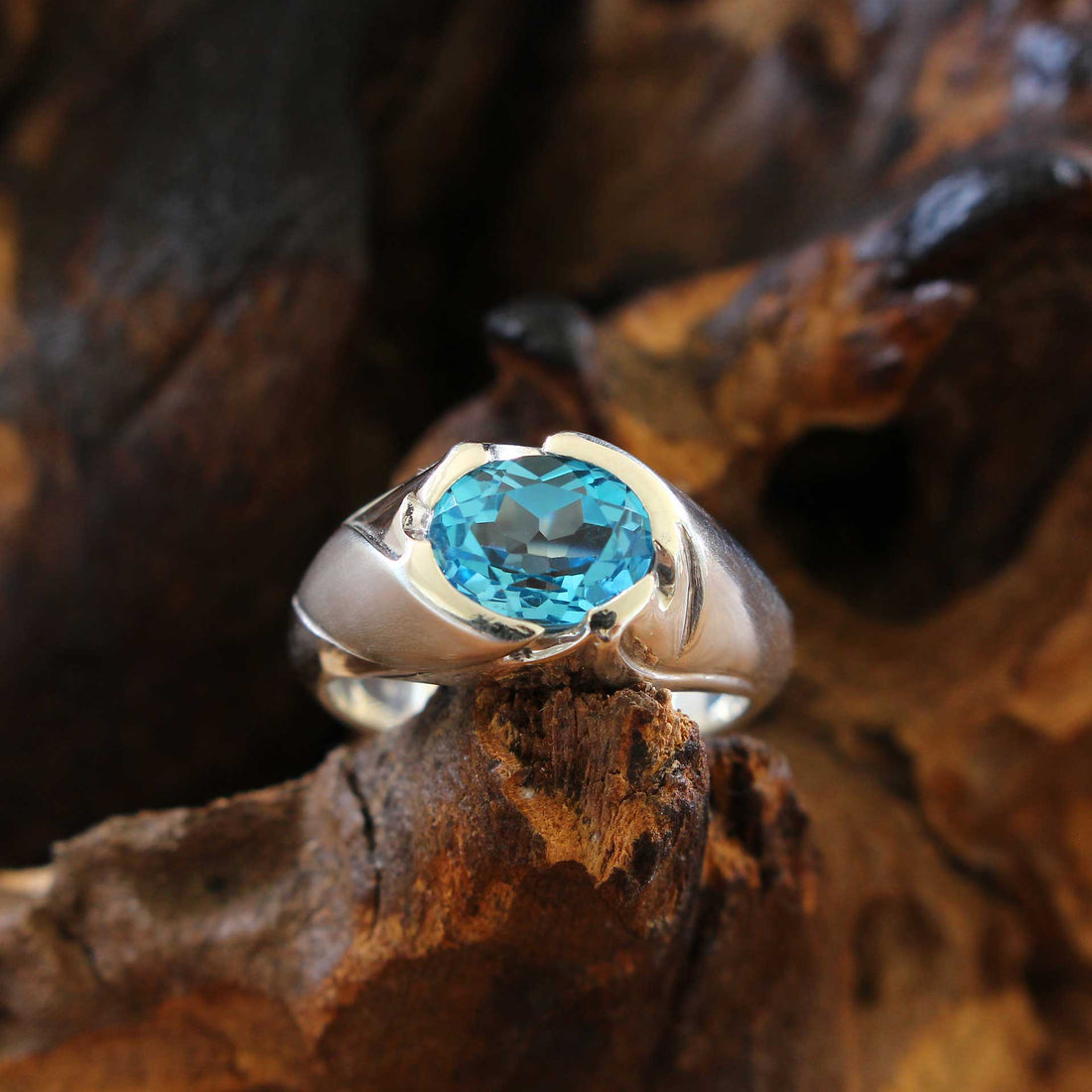 silver ring floral with blue topaz