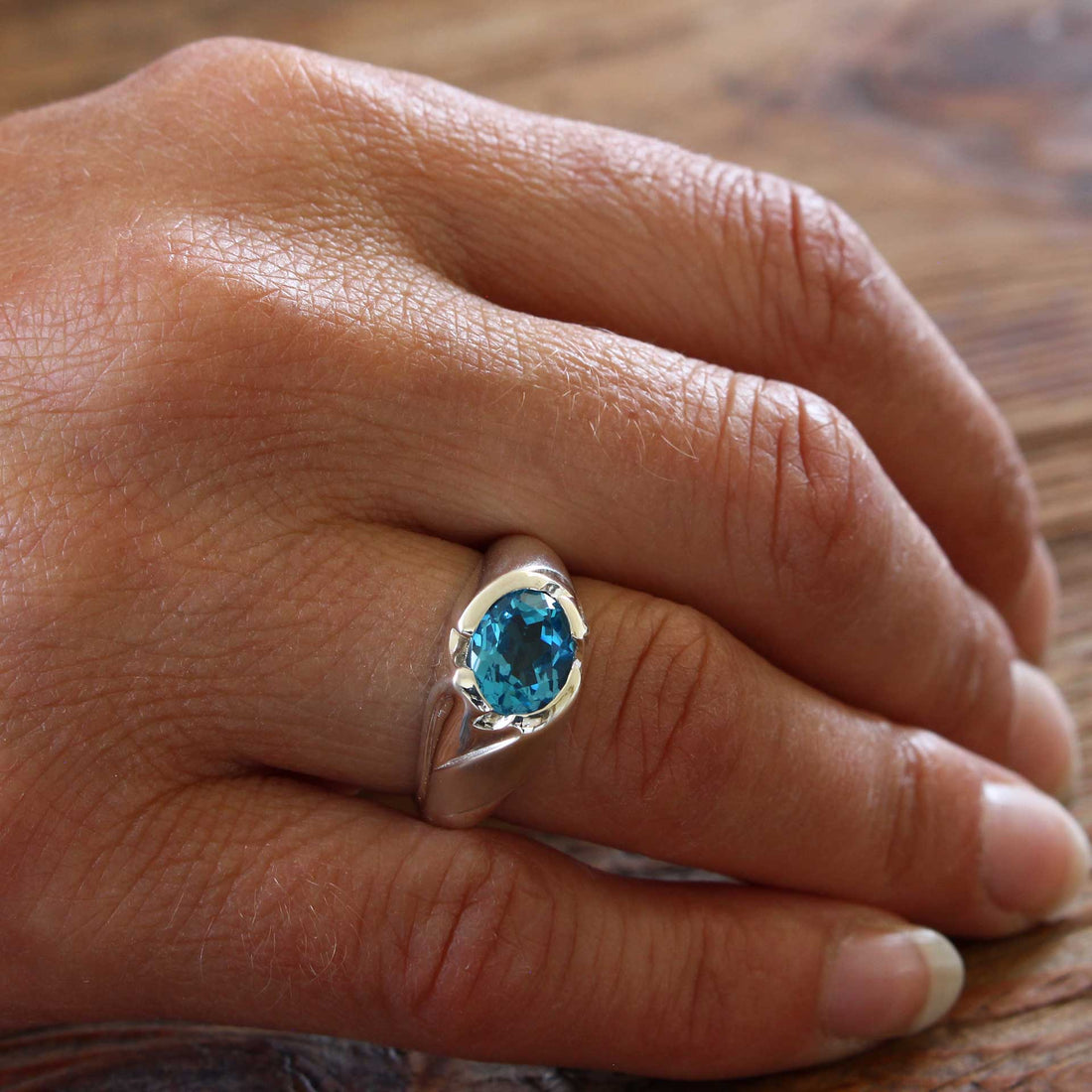 silver ring floral with blue topaz