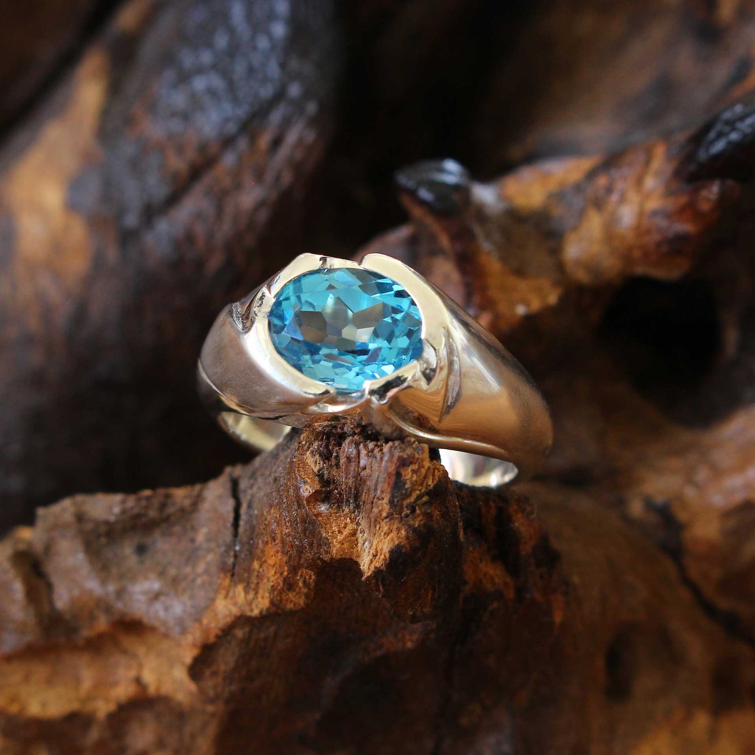 silver ring floral with blue topaz