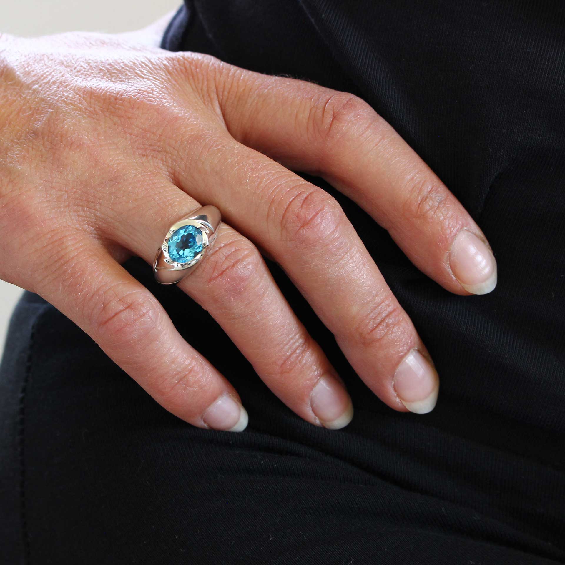 silver ring floral with blue topaz