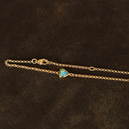 Gold bracelet with opal heart 14ct.