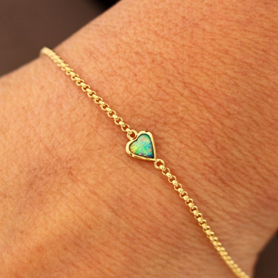 Gold bracelet with opal heart 14ct.