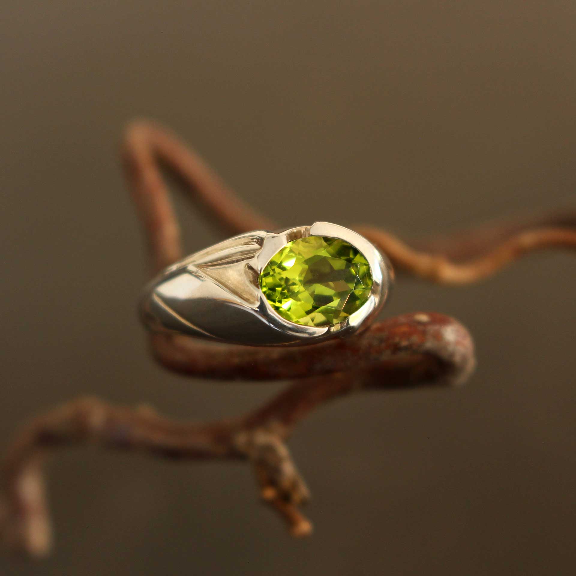 silver ring floral with peridot