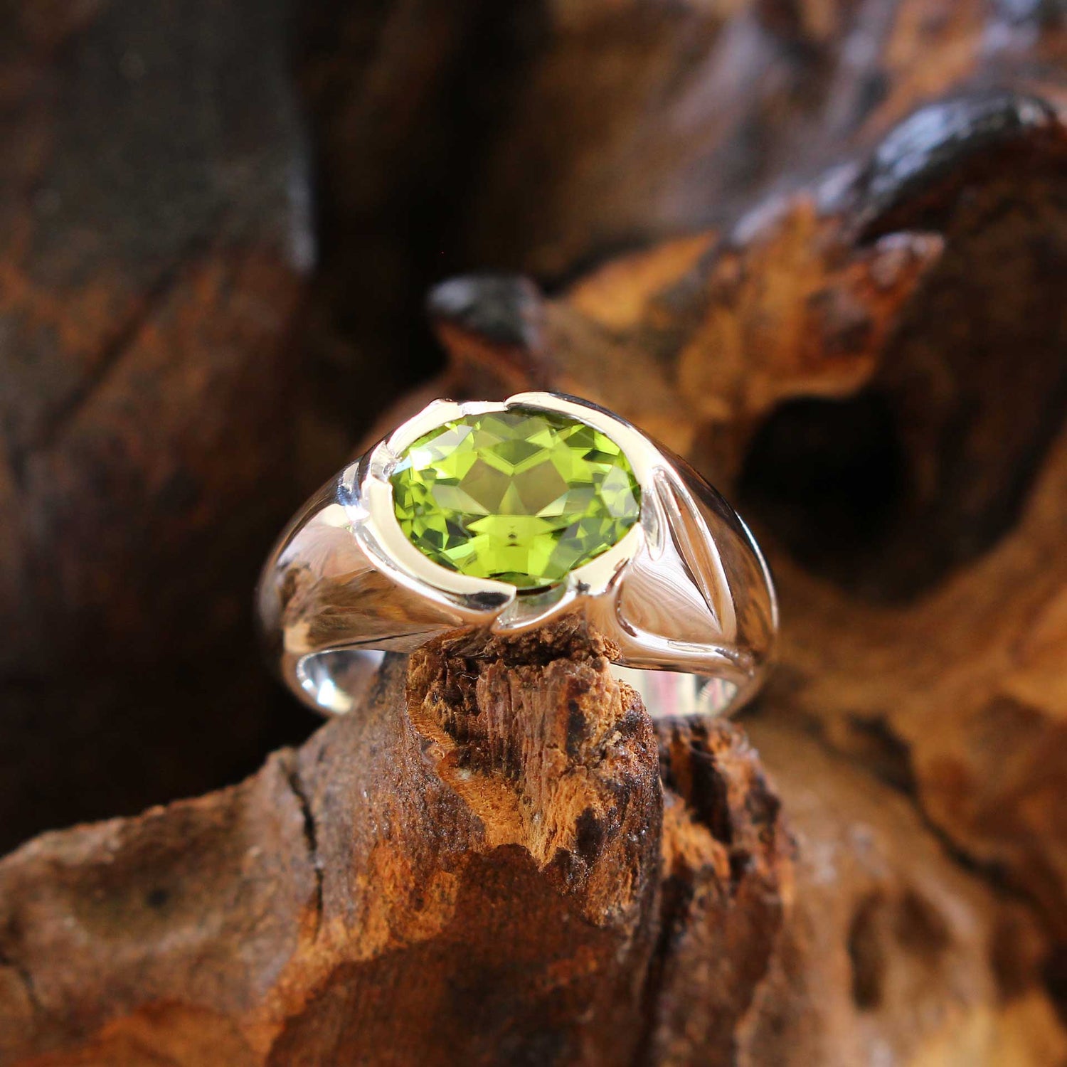 silver ring floral with peridot