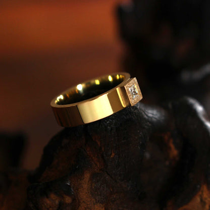 gold ring with princess-cut diamond