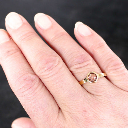 gold ring with cognac-colored zircon